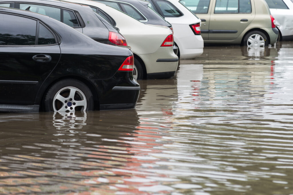 Car in water after heavy rain and flood